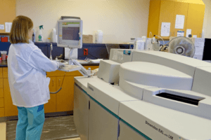 Technician at diagnostic imaging equipment at Munising Memorial Healthcare Facility – healthcare construction consultants