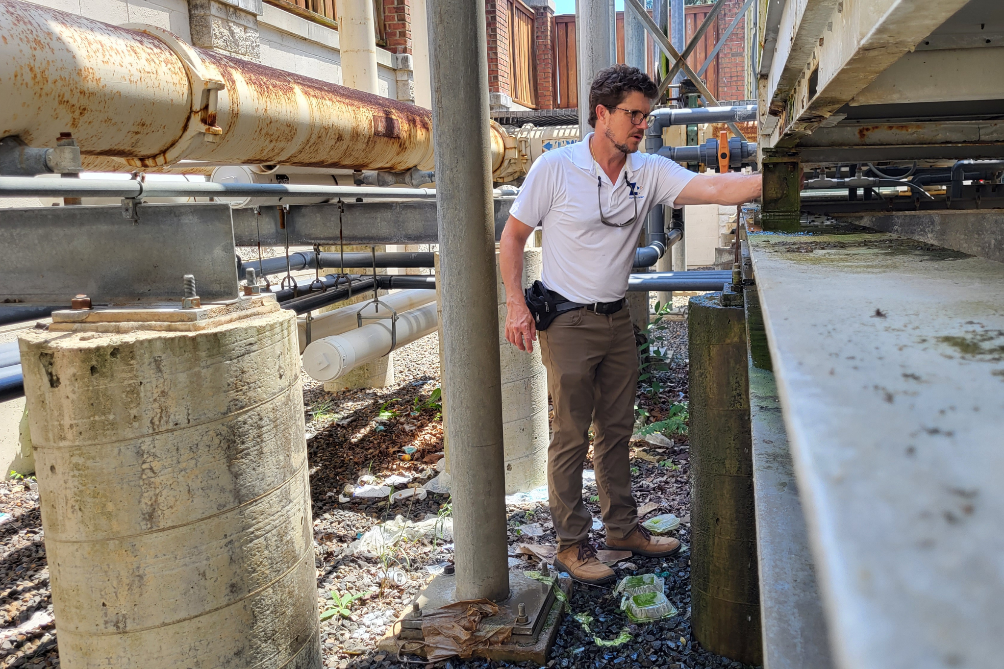 zumBrunnen_school_property_condition_assessment Rob Milan, CEO of zumBrunnen, on-site at a school conducting a school property condition assessment.