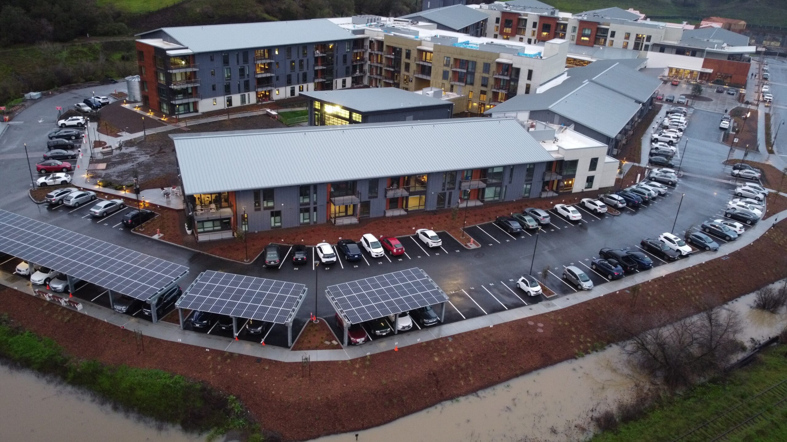 DCIM101MEDIADJI_0832.JPG Aerial view of Enso Village courtyard buildings and parking, monitored by zumBrunnen