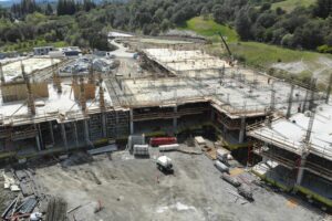 created by dji camera Aerial view of concrete framing at the Enso Village senior living construction site for zumBrunnen