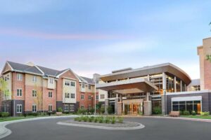 Lutheran_Life_Communities_Senior_Living_Lutheran_Home Lutheran Life Communities senior living building entrance with brick and stone